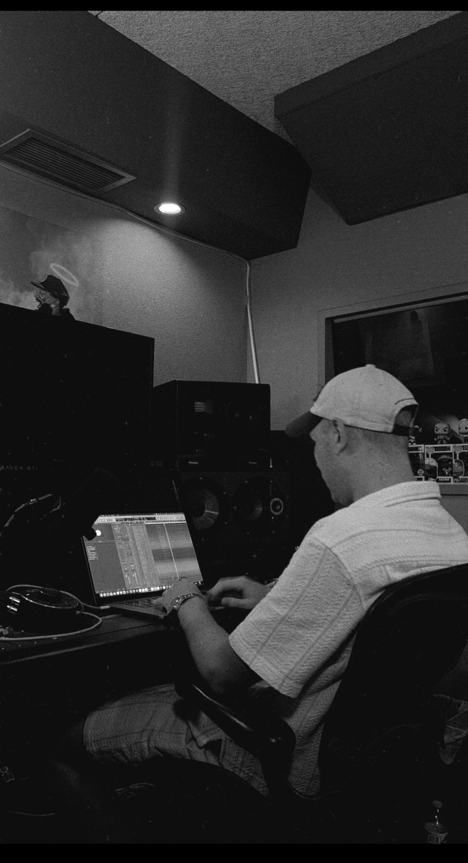 ØSTMOE working on a mix in the studio